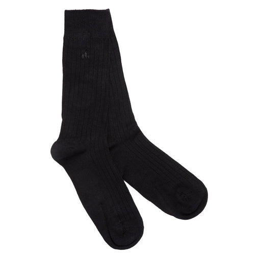 Pair of black socks on a white background